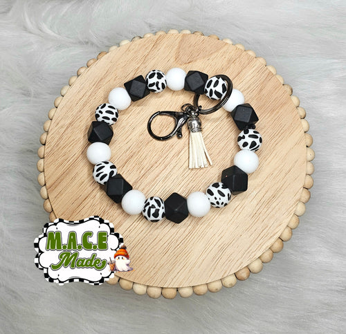 Cow Print Beaded Wristlet